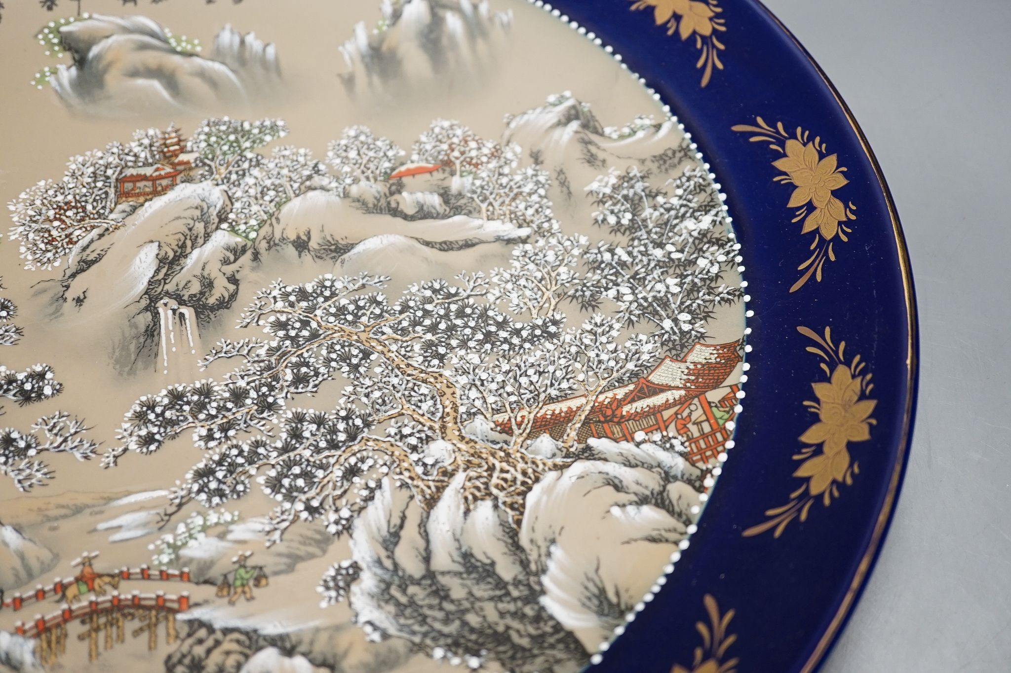 A late 19th century famille rose bowl and a Chinese porcelain dish, bowl 30 cms diameter.